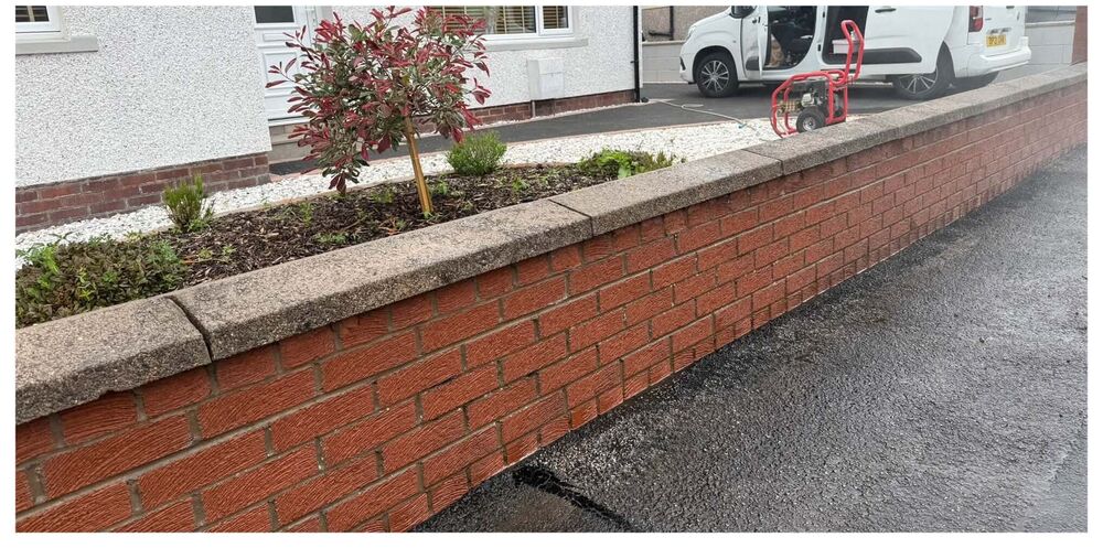 The same wall cleaned back to bright red brick